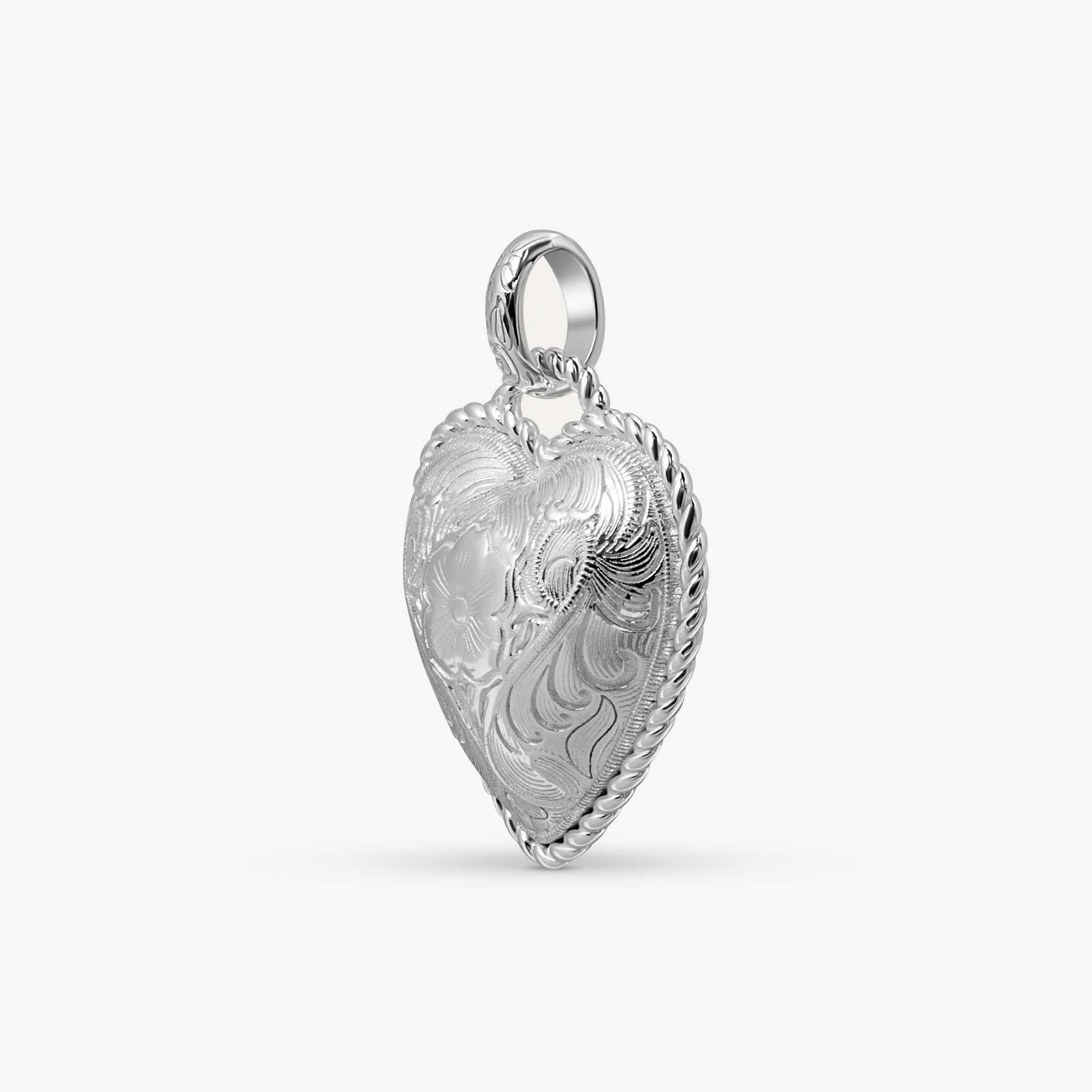 EtchedFloralHeartCharm-Silver-Angled.jpg