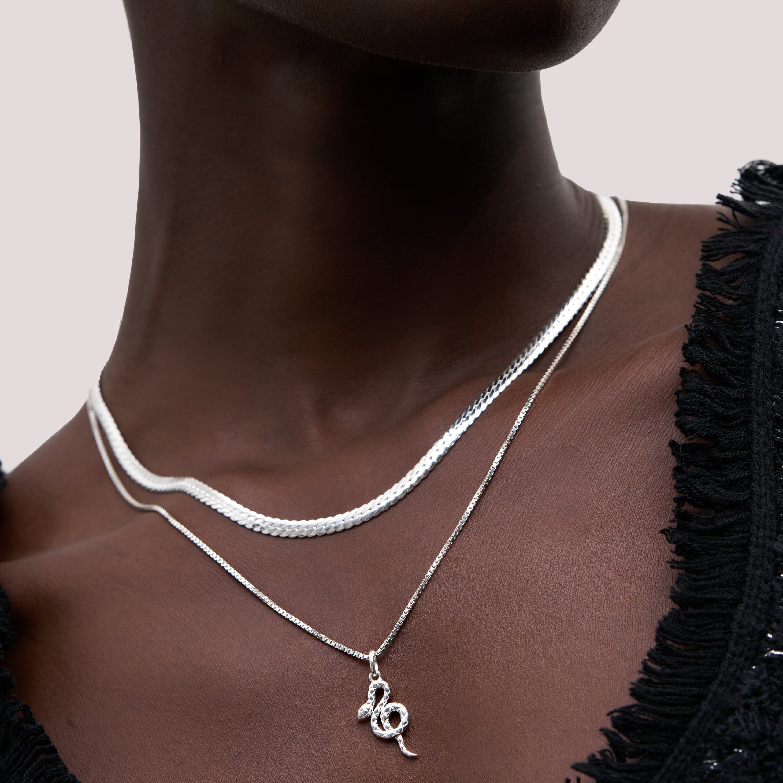 IntertwineChainNecklace_SerpentCharm-Silver-Close-up.jpg